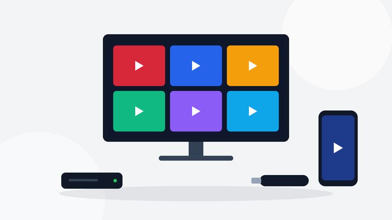 TV with streaming tiles, an Android TV box, a streaming stick and a phone, illustrating the best IPTV devices in Canada